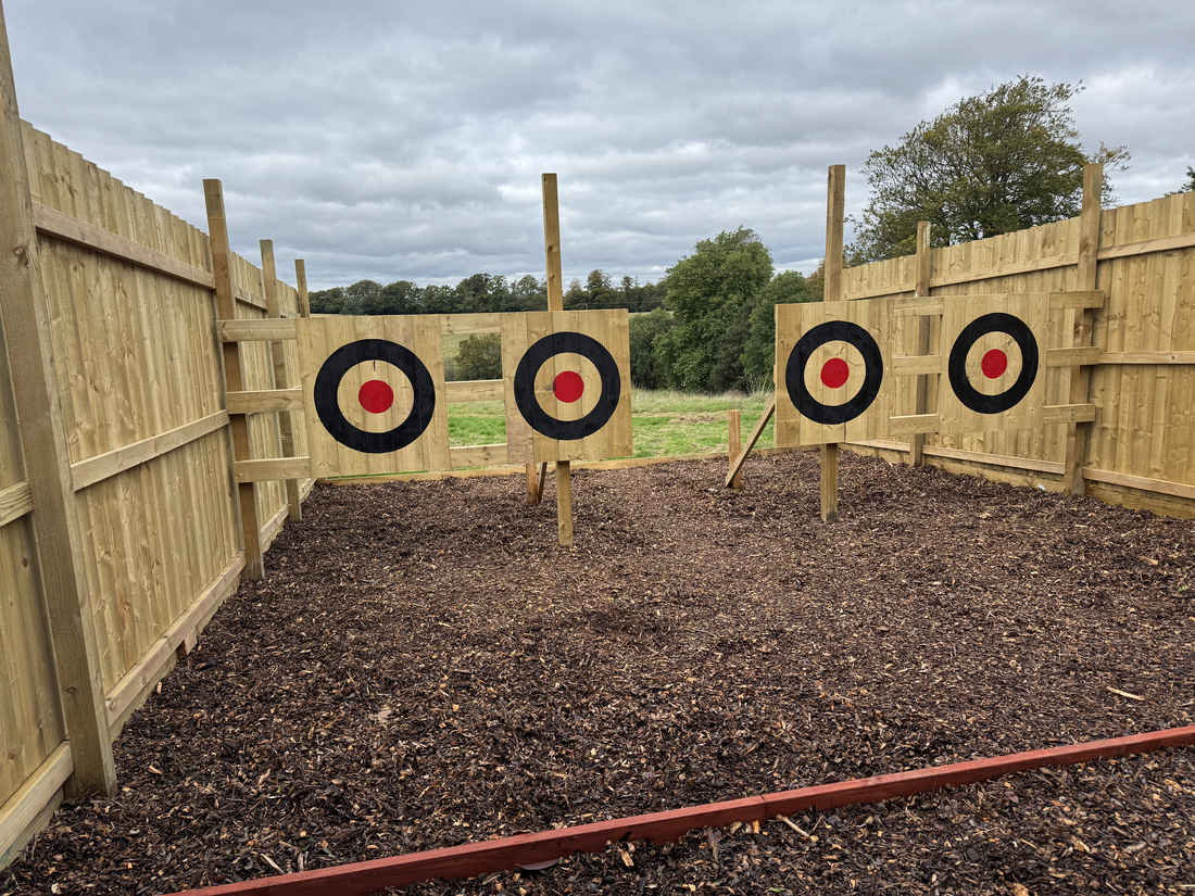 Four targets in the outdoor axe throwing area